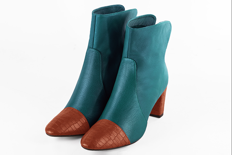 Terracotta orange and peacock blue women's ankle boots with a zip at the back. Round toe. Medium block heels. Front view - Florence KOOIJMAN